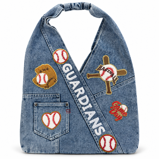 Cleveland Guardians Patch Denim Sling Bag on a clean white studio background